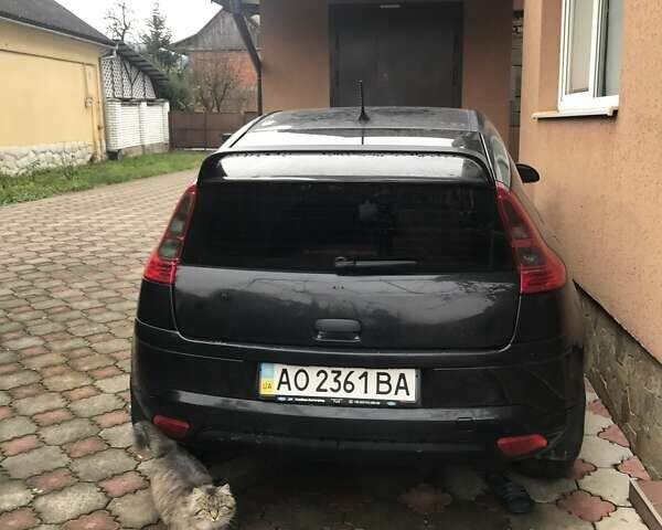 Черный Ситроен С4, объемом двигателя 1.59 л и пробегом 190 тыс. км за 4500 $, фото 1 на Automoto.ua