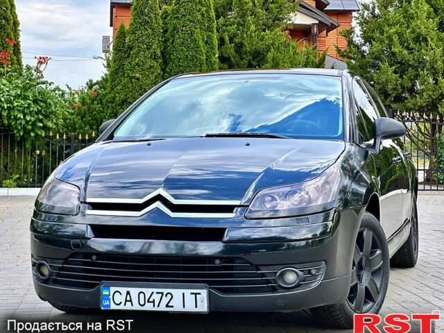 Черный Ситроен С4, объемом двигателя 2 л и пробегом 259 тыс. км за 5900 $, фото 1 на Automoto.ua