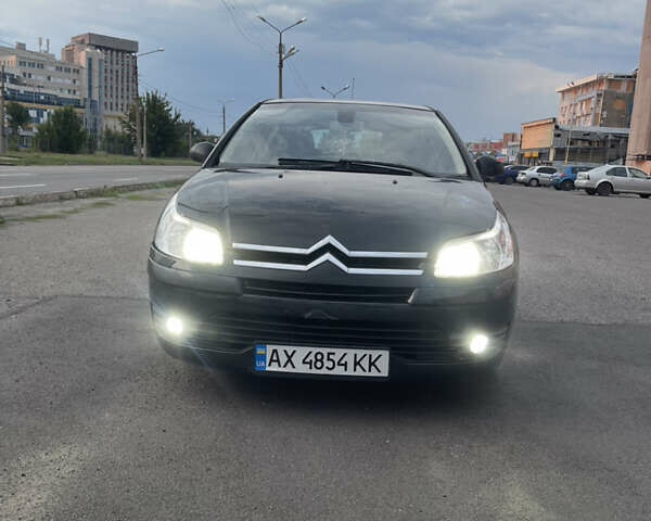Черный Ситроен С4, объемом двигателя 1.59 л и пробегом 295 тыс. км за 3700 $, фото 1 на Automoto.ua