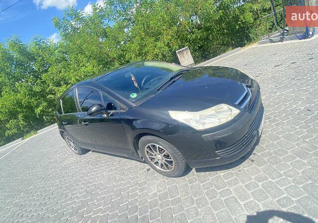 Черный Ситроен С4, объемом двигателя 1.6 л и пробегом 210 тыс. км за 4600 $, фото 1 на Automoto.ua