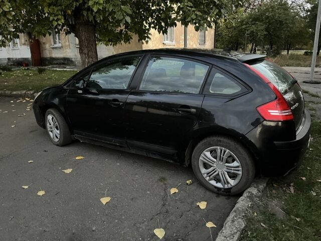 Черный Ситроен С4, объемом двигателя 1.6 л и пробегом 204 тыс. км за 2800 $, фото 1 на Automoto.ua