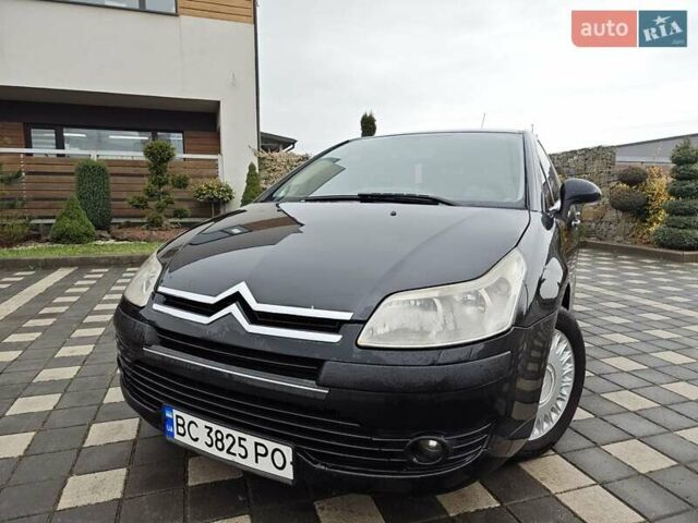 Черный Ситроен С4, объемом двигателя 1.6 л и пробегом 318 тыс. км за 3950 $, фото 1 на Automoto.ua