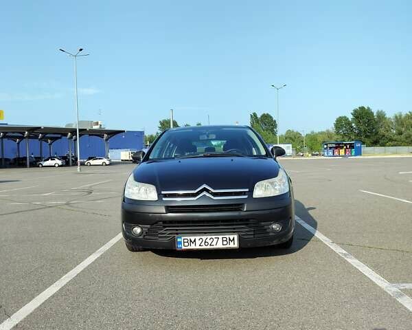 Черный Ситроен С4, объемом двигателя 1.6 л и пробегом 326 тыс. км за 3300 $, фото 1 на Automoto.ua