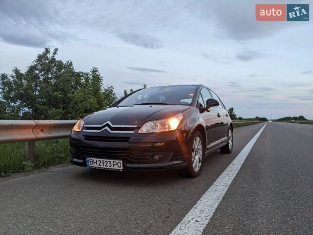 Черный Ситроен С4, объемом двигателя 2 л и пробегом 289 тыс. км за 4500 $, фото 1 на Automoto.ua