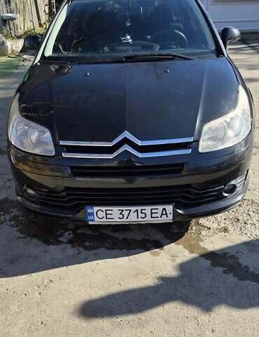 Черный Ситроен С4, объемом двигателя 1.62 л и пробегом 177 тыс. км за 6500 $, фото 1 на Automoto.ua