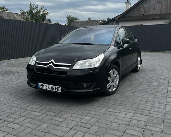 Черный Ситроен С4, объемом двигателя 1.56 л и пробегом 245 тыс. км за 4500 $, фото 1 на Automoto.ua