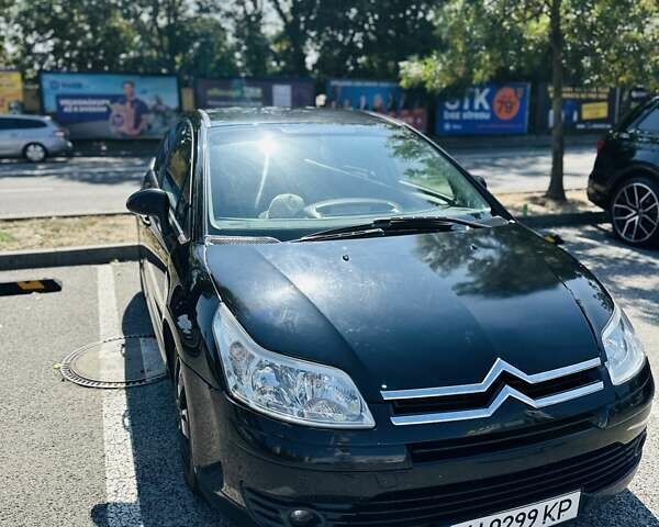 Черный Ситроен С4, объемом двигателя 1.6 л и пробегом 113 тыс. км за 4000 $, фото 1 на Automoto.ua