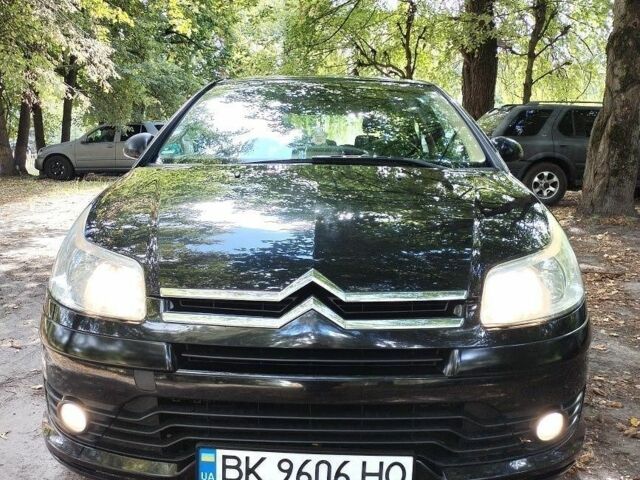 Черный Ситроен С4, объемом двигателя 1.6 л и пробегом 253 тыс. км за 3996 $, фото 1 на Automoto.ua