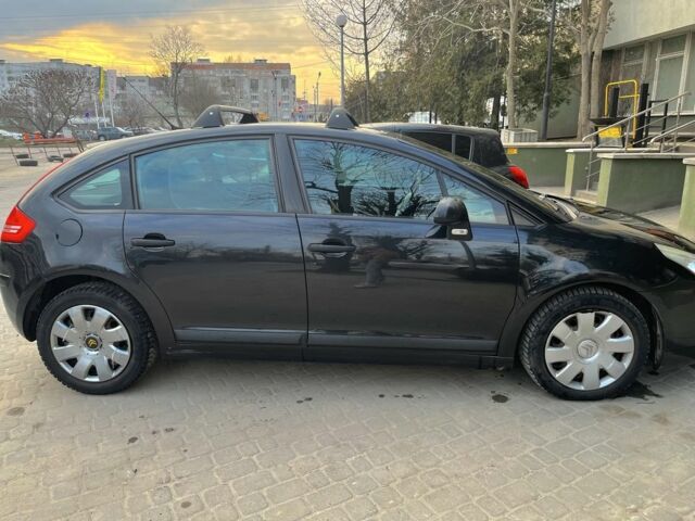 Черный Ситроен С4, объемом двигателя 1.6 л и пробегом 270 тыс. км за 4200 $, фото 1 на Automoto.ua