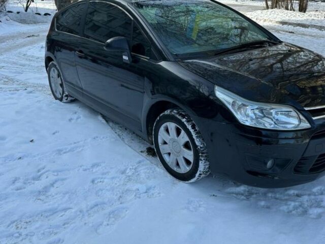 Черный Ситроен С4, объемом двигателя 1.6 л и пробегом 228 тыс. км за 3900 $, фото 1 на Automoto.ua