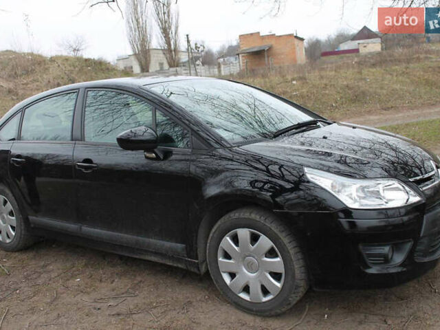 Черный Ситроен С4, объемом двигателя 1.6 л и пробегом 240 тыс. км за 5160 $, фото 1 на Automoto.ua