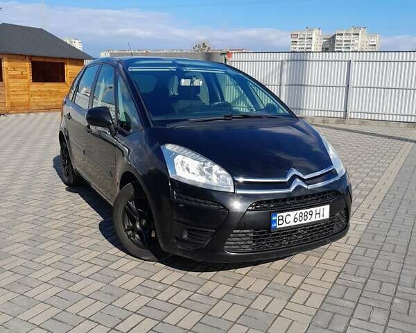 Черный Ситроен С4, объемом двигателя 1.56 л и пробегом 292 тыс. км за 4990 $, фото 1 на Automoto.ua