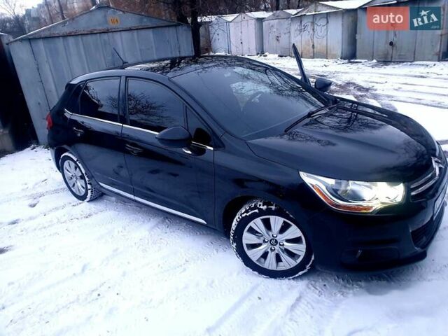 Черный Ситроен С4, объемом двигателя 1.6 л и пробегом 250 тыс. км за 7000 $, фото 1 на Automoto.ua