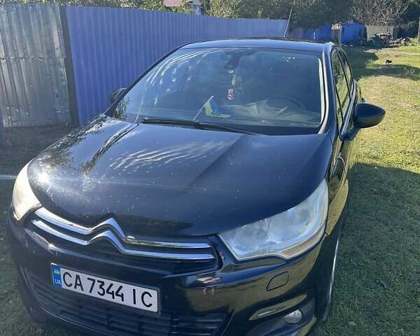 Черный Ситроен С4, объемом двигателя 1.56 л и пробегом 237 тыс. км за 6200 $, фото 1 на Automoto.ua