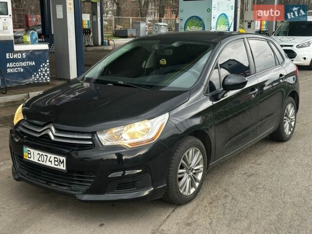 Черный Ситроен С4, объемом двигателя 1.56 л и пробегом 200 тыс. км за 6300 $, фото 1 на Automoto.ua