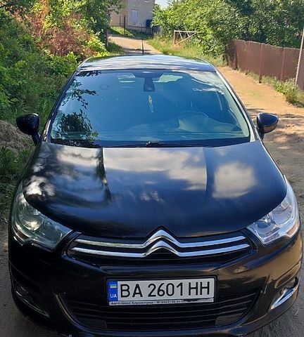 Черный Ситроен С4, объемом двигателя 1.56 л и пробегом 169 тыс. км за 4500 $, фото 1 на Automoto.ua