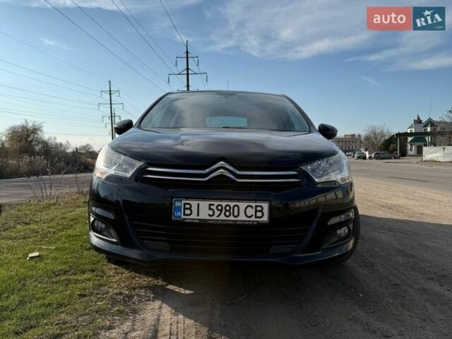 Черный Ситроен С4, объемом двигателя 1.56 л и пробегом 236 тыс. км за 7200 $, фото 1 на Automoto.ua
