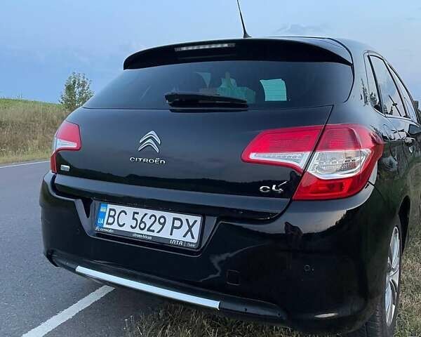 Черный Ситроен С4, объемом двигателя 1.56 л и пробегом 246 тыс. км за 7000 $, фото 1 на Automoto.ua