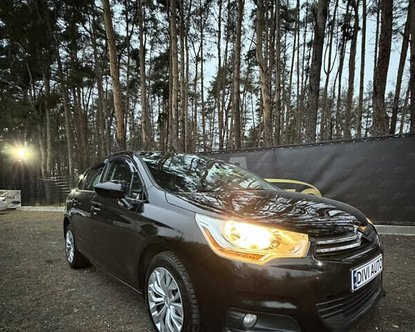 Черный Ситроен С4, объемом двигателя 1.6 л и пробегом 275 тыс. км за 7700 $, фото 1 на Automoto.ua