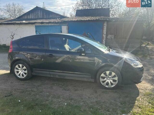 Черный Ситроен С4, объемом двигателя 1.6 л и пробегом 308 тыс. км за 2600 $, фото 1 на Automoto.ua