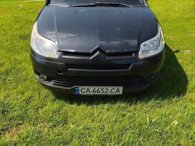 Черный Ситроен С4, объемом двигателя 1.59 л и пробегом 300 тыс. км за 2200 $, фото 1 на Automoto.ua