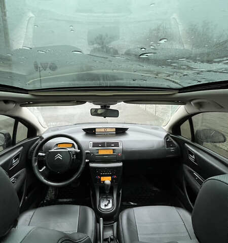 Черный Ситроен С4, объемом двигателя 1.6 л и пробегом 315 тыс. км за 3000 $, фото 1 на Automoto.ua