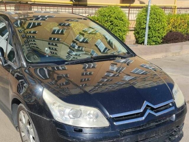 Черный Ситроен С4, объемом двигателя 1.6 л и пробегом 310 тыс. км за 4500 $, фото 1 на Automoto.ua