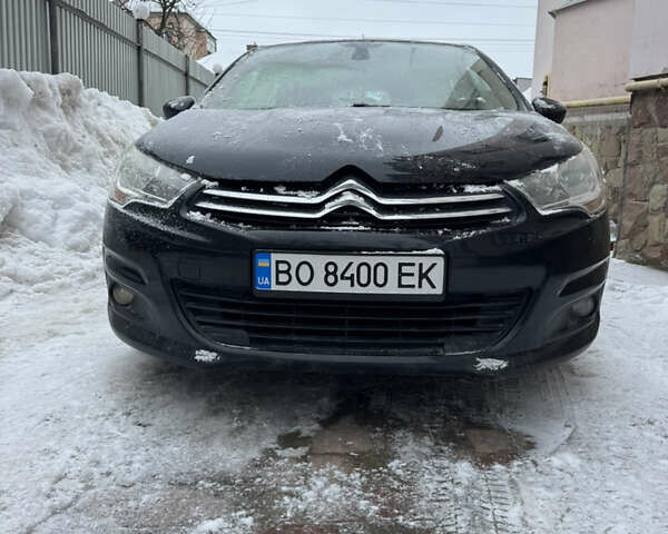 Черный Ситроен С4, объемом двигателя 1.59 л и пробегом 225 тыс. км за 6800 $, фото 1 на Automoto.ua