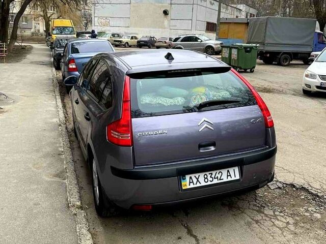 Фиолетовый Ситроен С4, объемом двигателя 1.6 л и пробегом 248 тыс. км за 4800 $, фото 1 на Automoto.ua