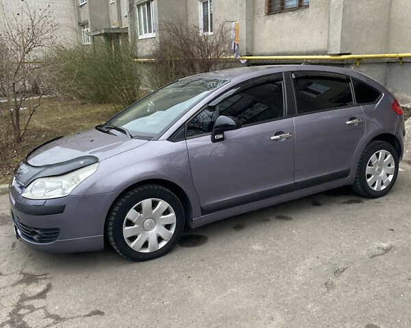 Фиолетовый Ситроен С4, объемом двигателя 1.59 л и пробегом 265 тыс. км за 4700 $, фото 1 на Automoto.ua