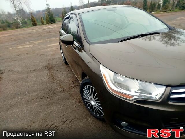 Коричневый Ситроен С4, объемом двигателя 1.6 л и пробегом 290 тыс. км за 6100 $, фото 1 на Automoto.ua