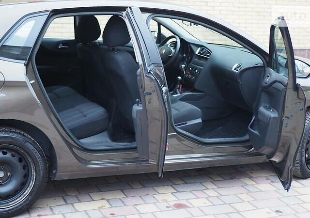 Коричневый Ситроен С4, объемом двигателя 1.6 л и пробегом 167 тыс. км за 6950 $, фото 1 на Automoto.ua