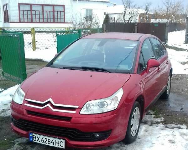 Красный Ситроен С4, объемом двигателя 1.6 л и пробегом 245 тыс. км за 4500 $, фото 1 на Automoto.ua