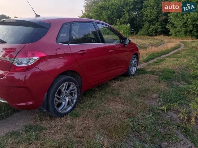 Красный Ситроен С4, объемом двигателя 1.6 л и пробегом 139 тыс. км за 7750 $, фото 1 на Automoto.ua