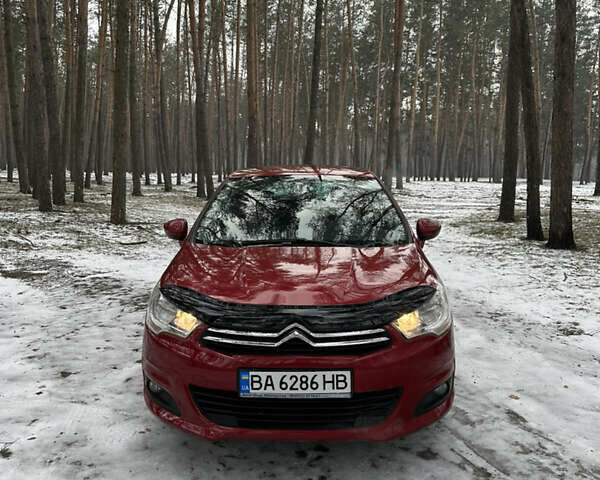 Червоний Сітроен С4, об'ємом двигуна 1.59 л та пробігом 136 тис. км за 7500 $, фото 1 на Automoto.ua
