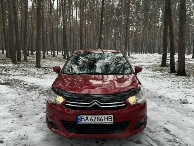 Красный Ситроен С4, объемом двигателя 1.6 л и пробегом 136 тыс. км за 7500 $, фото 1 на Automoto.ua