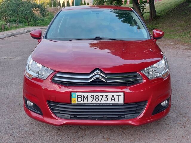 Красный Ситроен С4, объемом двигателя 1.6 л и пробегом 65 тыс. км за 9700 $, фото 1 на Automoto.ua