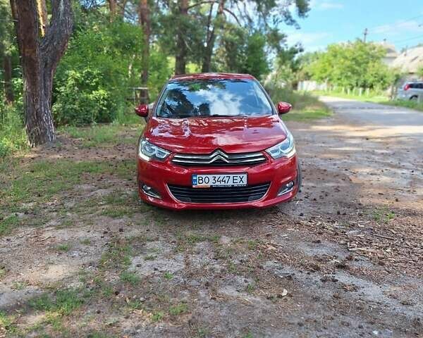 Красный Ситроен С4, объемом двигателя 1.6 л и пробегом 216 тыс. км за 10750 $, фото 1 на Automoto.ua
