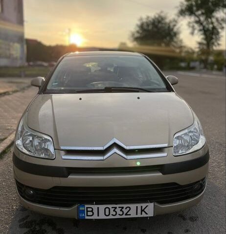 Желтый Ситроен С4, объемом двигателя 1.4 л и пробегом 222 тыс. км за 4000 $, фото 1 на Automoto.ua