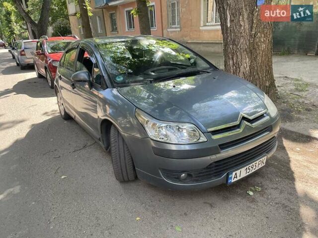 Серый Ситроен С4, объемом двигателя 1.36 л и пробегом 180 тыс. км за 3800 $, фото 1 на Automoto.ua