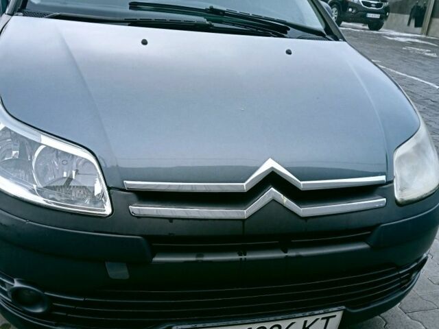 Серый Ситроен С4, объемом двигателя 1.6 л и пробегом 253 тыс. км за 4000 $, фото 1 на Automoto.ua