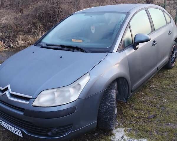 Серый Ситроен С4, объемом двигателя 1.36 л и пробегом 223 тыс. км за 3300 $, фото 1 на Automoto.ua