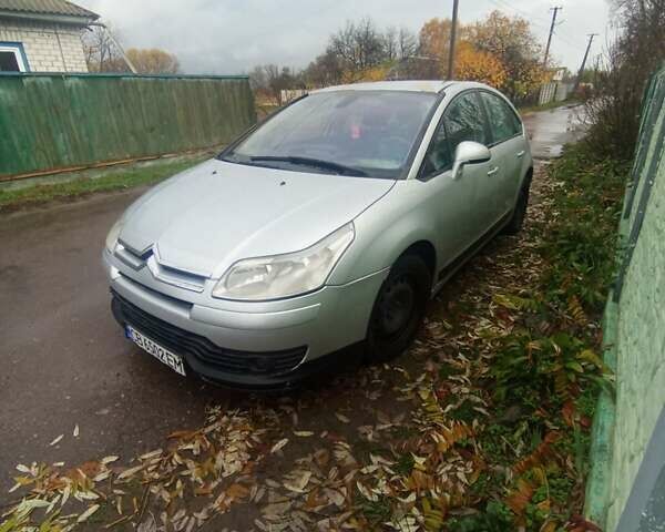 Серый Ситроен С4, объемом двигателя 1.6 л и пробегом 320 тыс. км за 4000 $, фото 1 на Automoto.ua