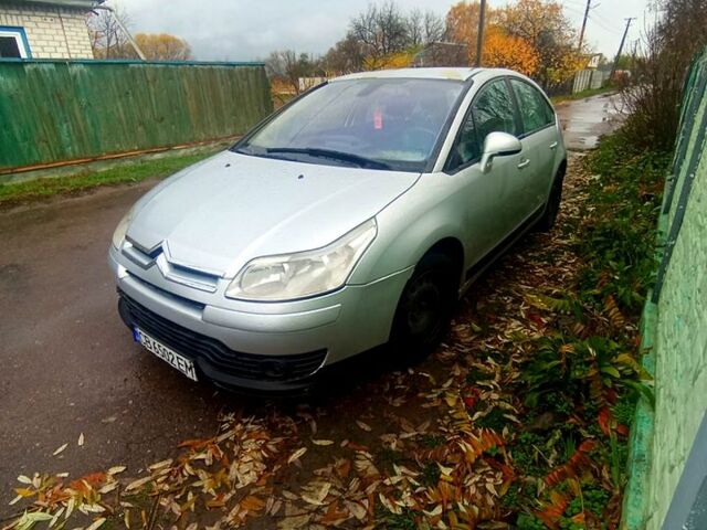 Серый Ситроен С4, объемом двигателя 1.6 л и пробегом 322 тыс. км за 4000 $, фото 1 на Automoto.ua