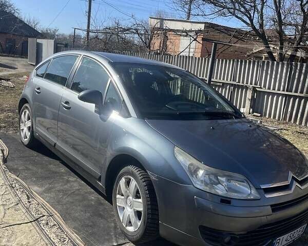 Серый Ситроен С4, объемом двигателя 1.6 л и пробегом 280 тыс. км за 5200 $, фото 1 на Automoto.ua