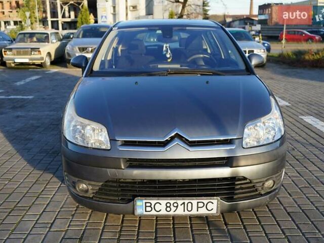 Серый Ситроен С4, объемом двигателя 1.4 л и пробегом 300 тыс. км за 4499 $, фото 1 на Automoto.ua