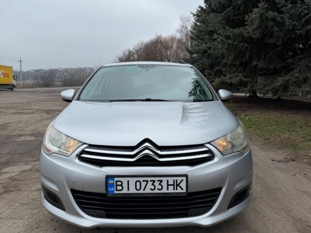 Серый Ситроен С4, объемом двигателя 1.6 л и пробегом 240 тыс. км за 5600 $, фото 1 на Automoto.ua