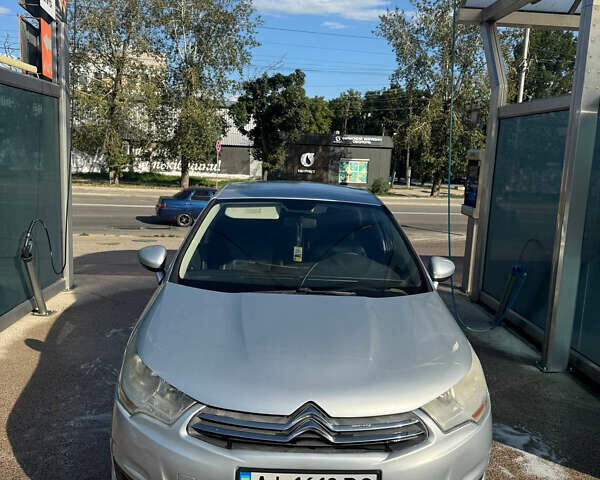 Серый Ситроен С4, объемом двигателя 1.6 л и пробегом 248 тыс. км за 6000 $, фото 1 на Automoto.ua