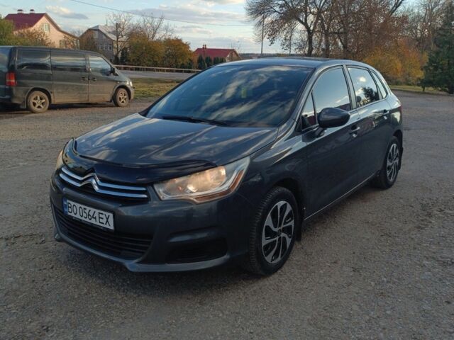 Серый Ситроен С4, объемом двигателя 1.6 л и пробегом 163 тыс. км за 5600 $, фото 1 на Automoto.ua