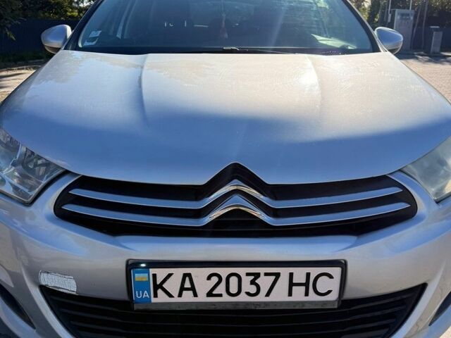 Серый Ситроен С4, объемом двигателя 1.6 л и пробегом 192 тыс. км за 7000 $, фото 1 на Automoto.ua
